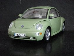 Volkswagen New Beetle 1999 de couleur vert pastel mtallis (Vue ct conducteur)
