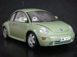 Volkswagen New Beetle 1999 de couleur vert pastel mtallis (Vue ct passager)