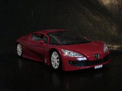 Peugeot Rc Carreau de couleur rouge fonc (Vue ct passager)