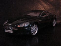 Aston Martin DB9 Coup de couleur noire (Vue ct passager)